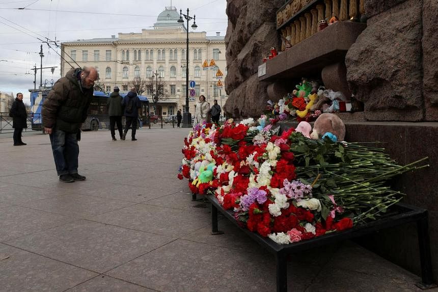 Lukashenko says concert hall attackers first headed for Belarus, contradicting Putin
