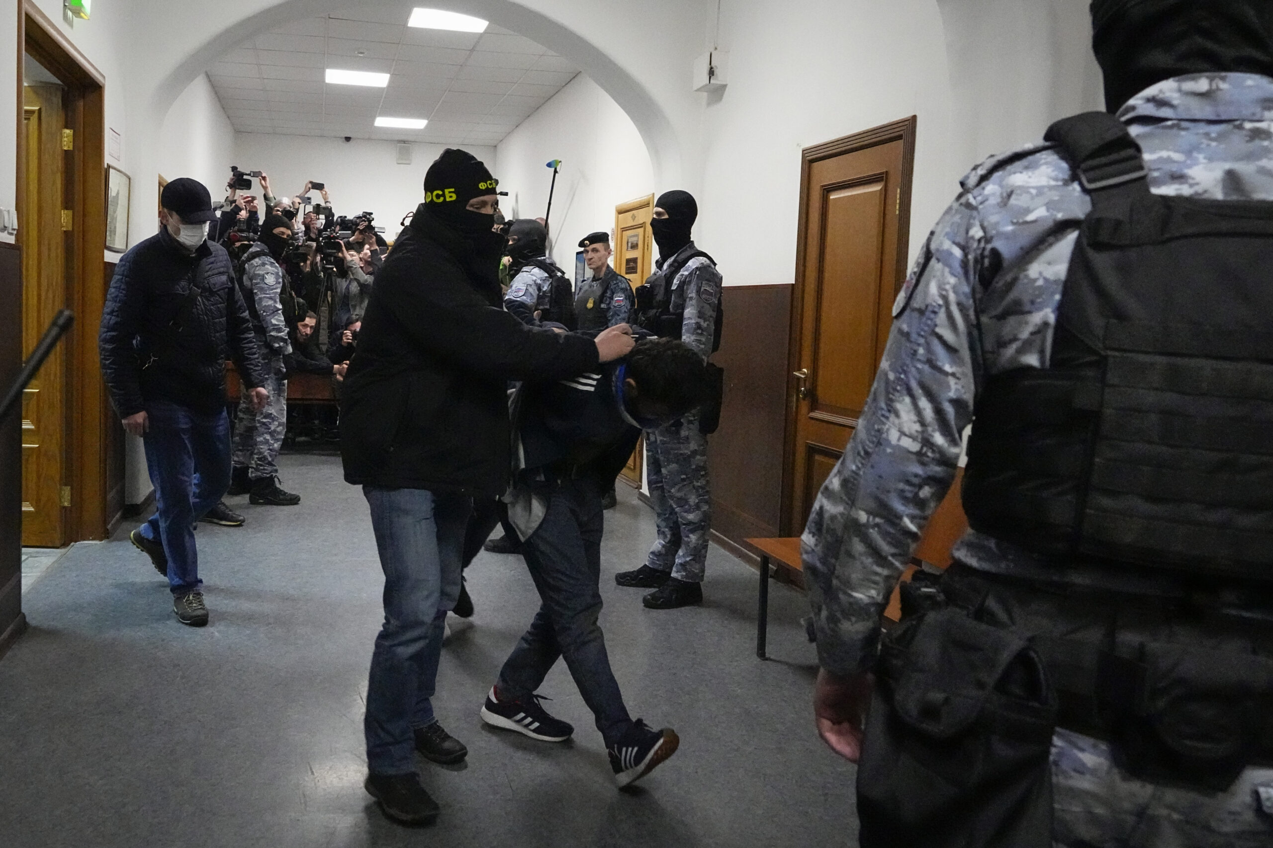 Russia Concert Hall Attack Suspects Appear in a Moscow Courtroom