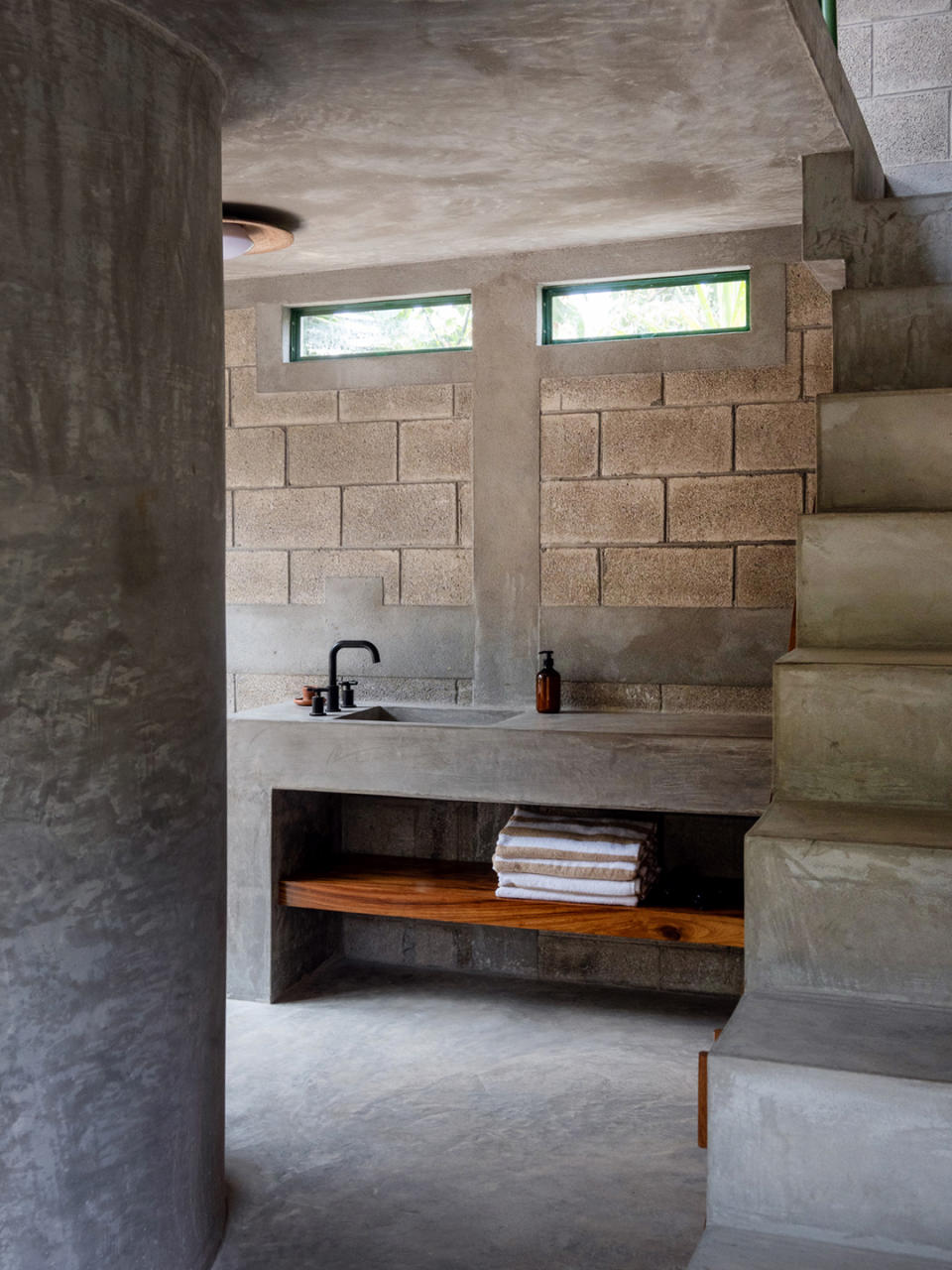 An Accidental Sunken Living Room Warms Up This Concrete Guatemalan Home