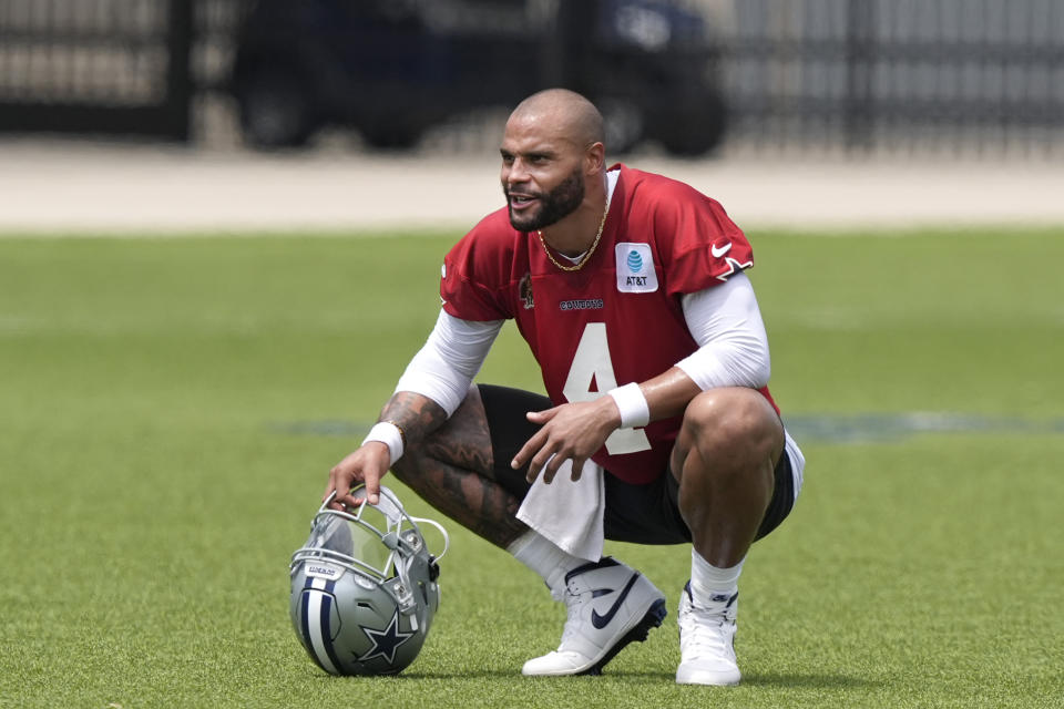 Cowboys QB Dak Prescott seen in walking boot on vacation; reportedly had ‘mild right foot sprain’