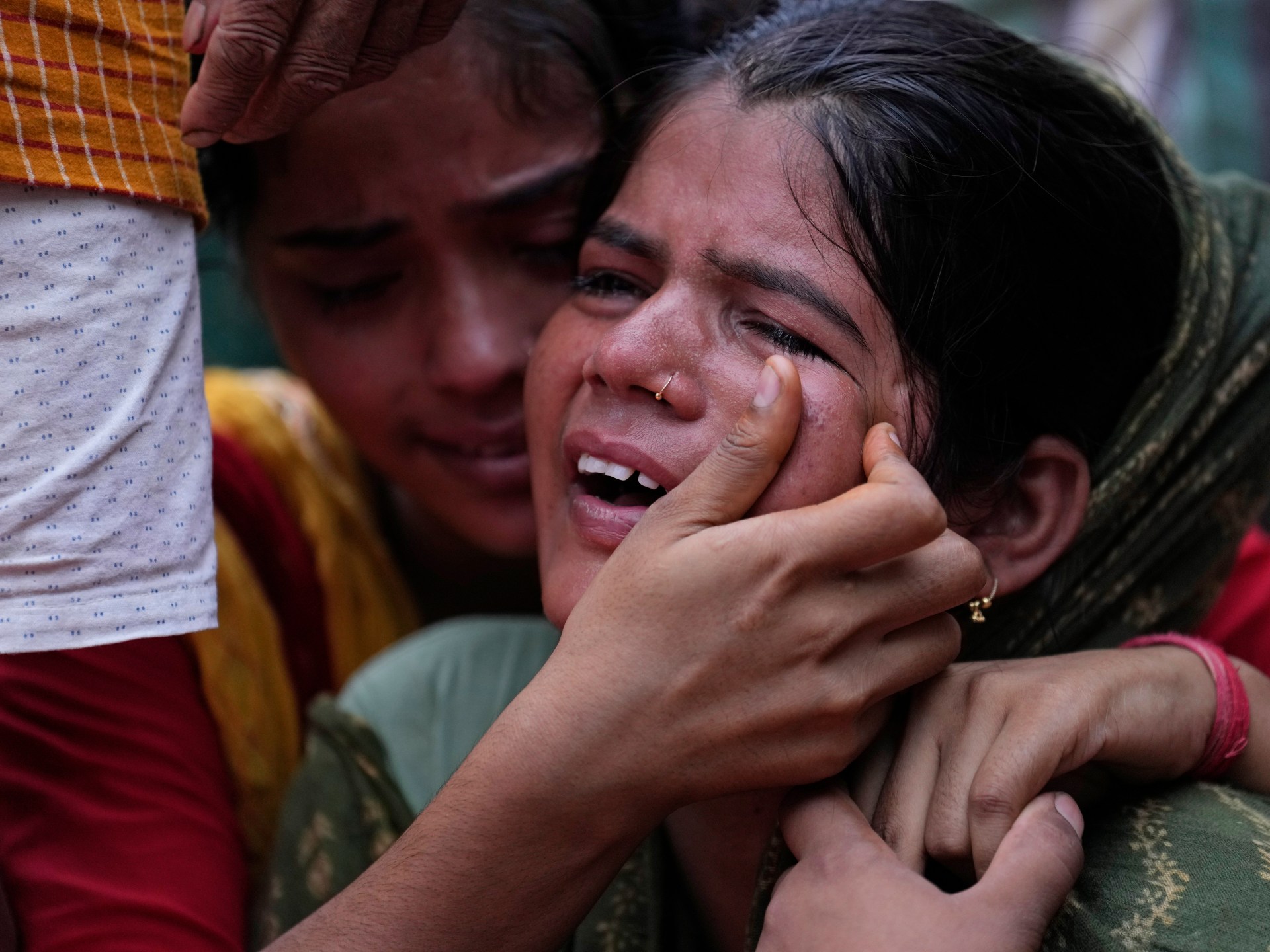 Families of India stampede victims ponder future without loved ones