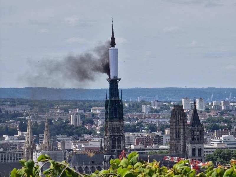 French firefighters stop blaze in spire of medieval Rouen Cathedral