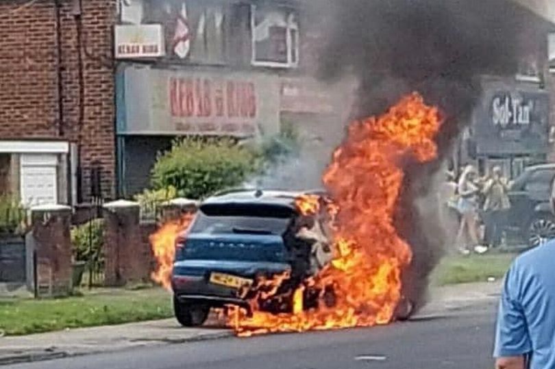 Horror as man and child suffer burns injuries after Volvo bursts into flames