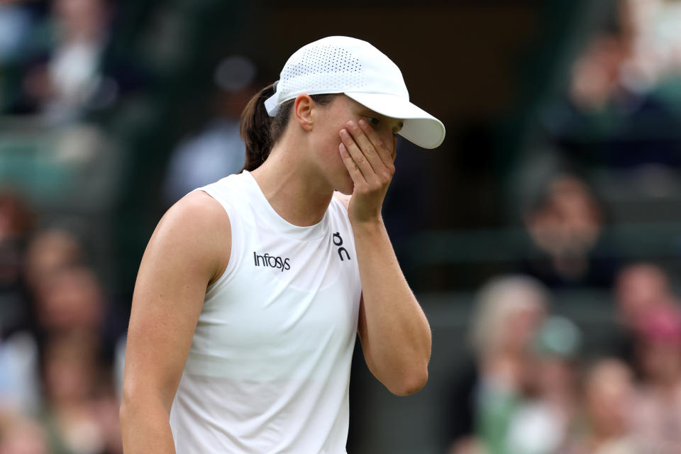 Iga Świątek, the women’s world No. 1, falls to Kazakhstan’s Yulia Putintseva at Wimbledon