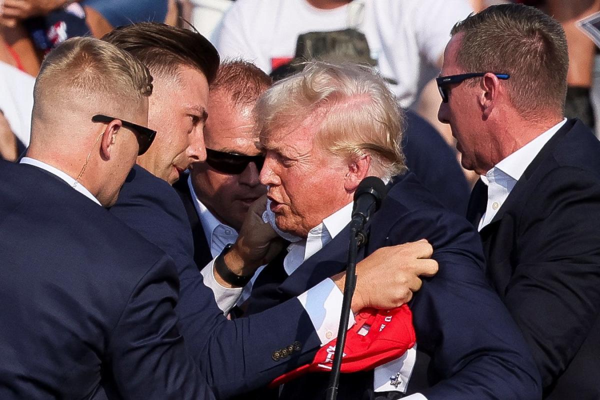 Images from Donald Trump rally in Butler, Pennsylvania where Trump was rushed off stage