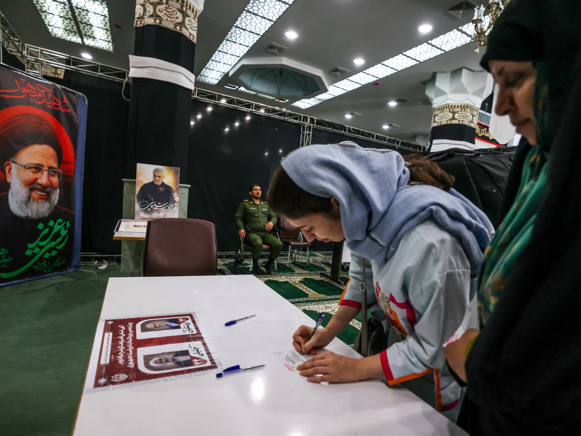 Iranians return to polls to pick new president amid voter turnout concerns