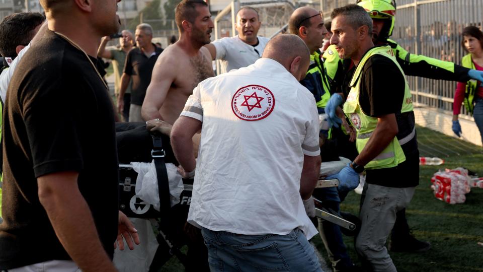 Israel hits Hezbollah targets after football pitch strike kills 12 young people