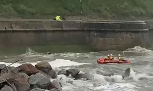 Man rescued from rough sea after jumping in to save dog