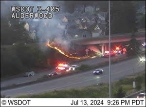 Motorcyclist crashes on I-5 in Lynnwood, sparking roadside fire