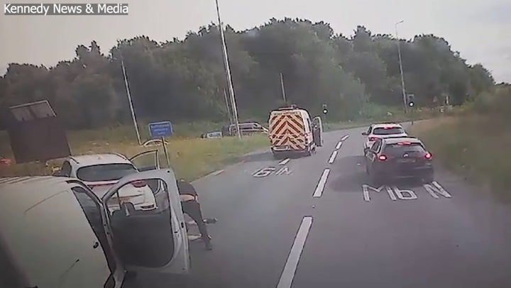 Motorists brawl in the road after leaving the motorway in road rage flashpoint