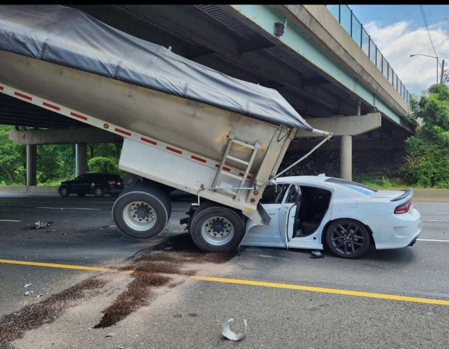 One injured after tractor-trailer hits bridge, car on I-495 in Montgomery County