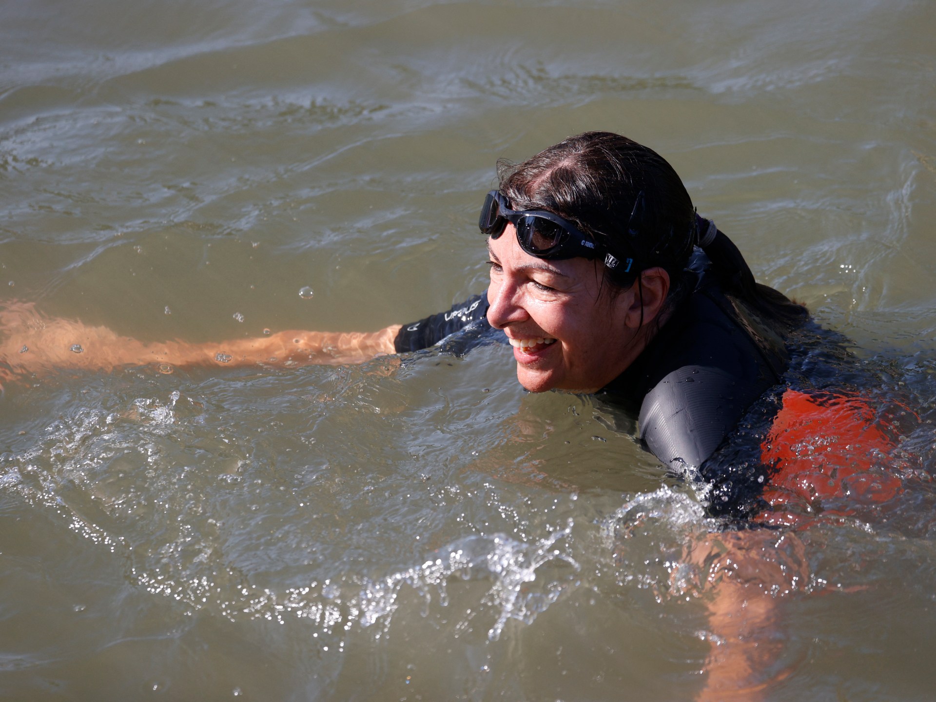 Paris mayor takes dip in ‘safe to swim Seine’ ahead of Olympics