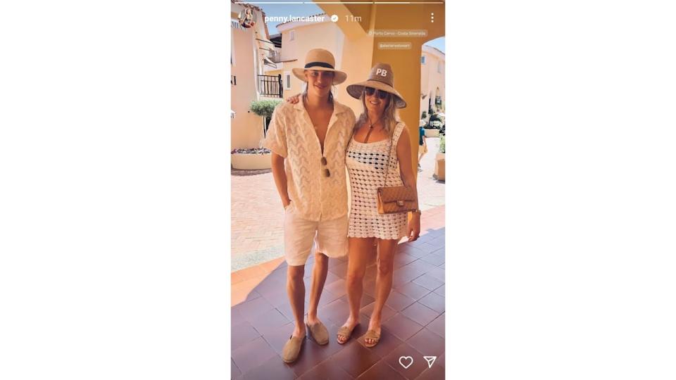 Penny Lancaster rocks crochet mini dress in holiday snap with towering model son Alastair