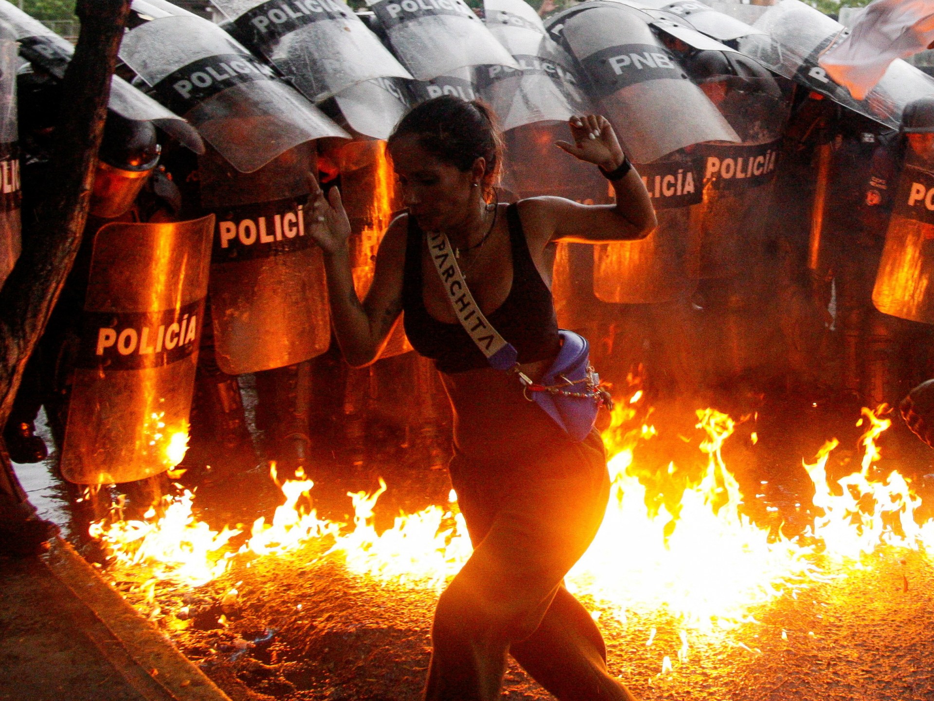 Police fire tear gas as crowds protest against Venezuela’s election count