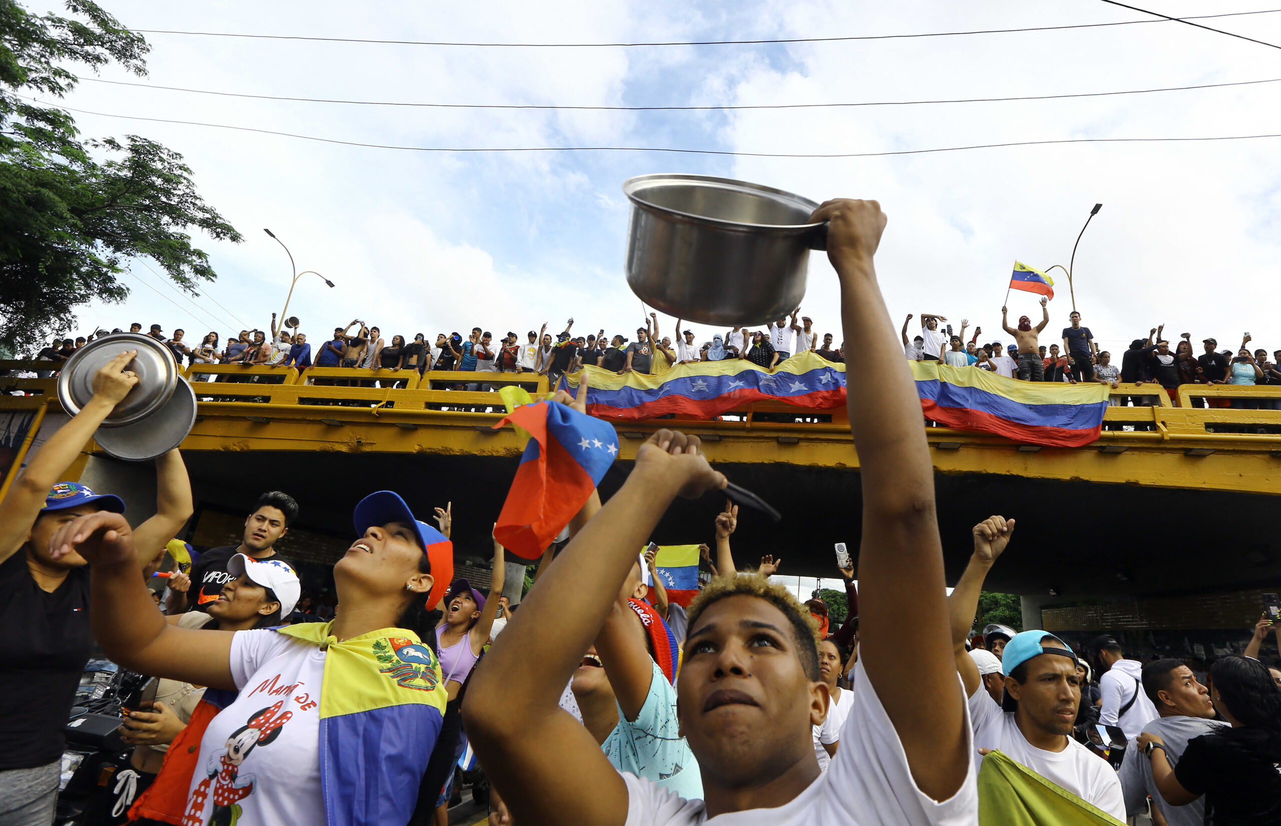 Protests erupt in Venezuela after Maduro claims victory in disputed election result