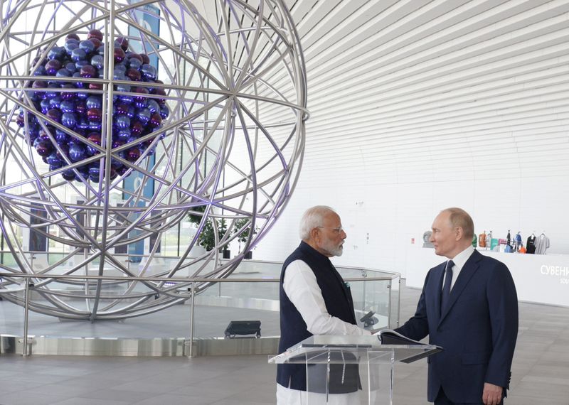 Russia talks up business with India as Modi visits Moscow