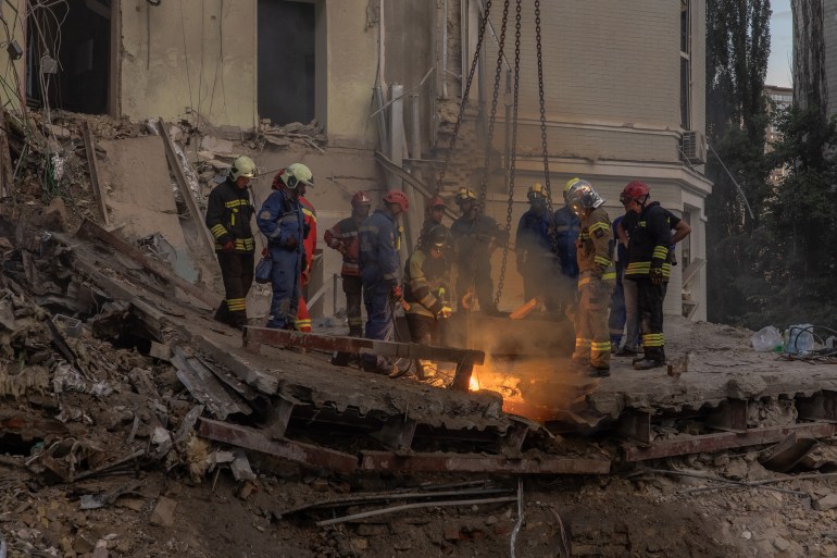 Search for survivors as Ukraine mourns after wave of deadly strikes