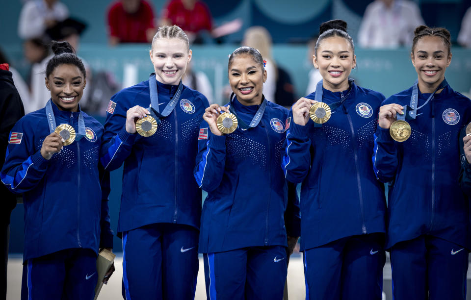 The glory of gold: Simone Biles grins as Team USA triumphs at women’s team final