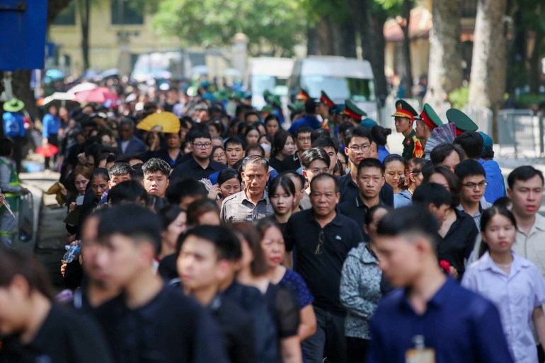 Thousands in Vietnam mourn at funeral of Communist Party chief Trong