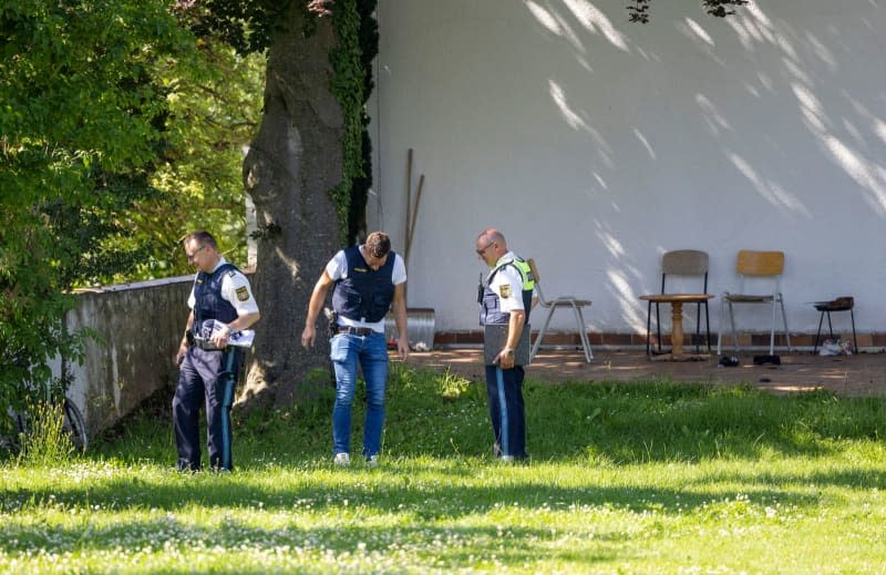 Three held after shots heard in refugee centre in southern Germany