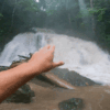 Tourists Run for Their Lives When Waterfall Suddenly Surges Amid Flash Flood