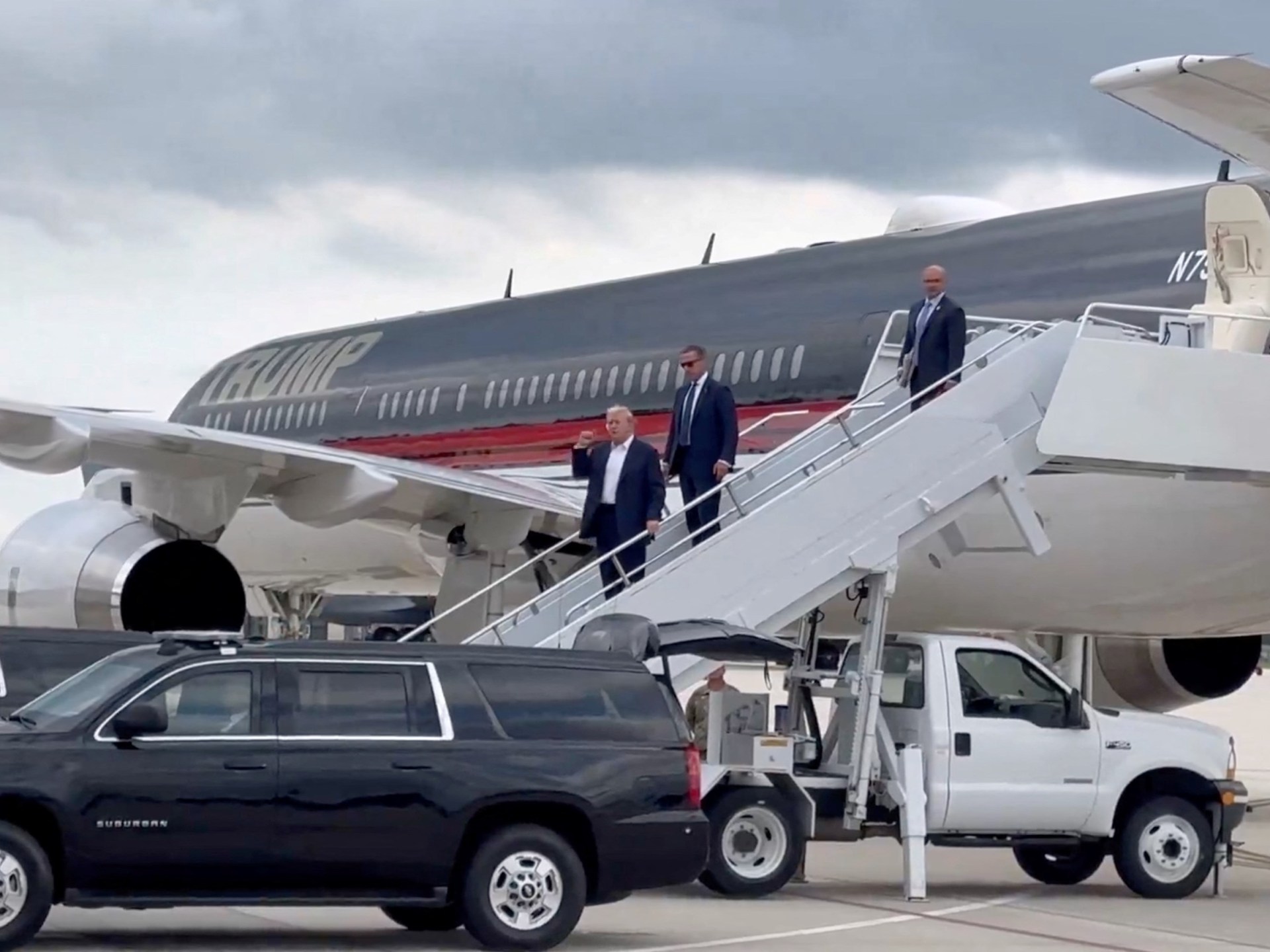 Trump lands in Milwaukee, a day after assassination attempt