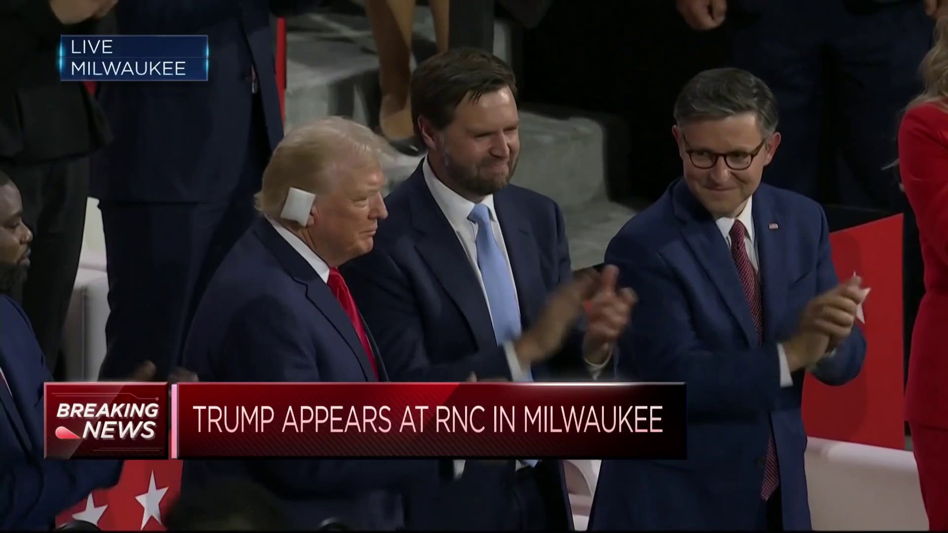 Trump lauded at Republican convention, his first public appearance since assassination attempt