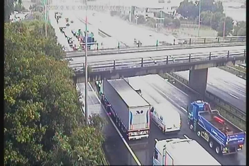 Two dead in M62 horror as crash between two lorries and car shuts motorway for hours