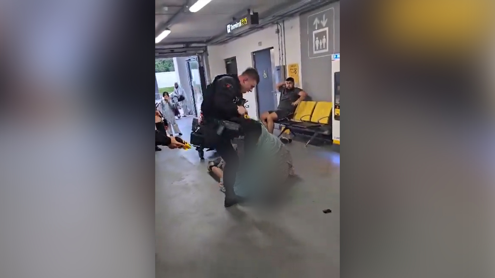 UK police officer filmed kicking man in the face