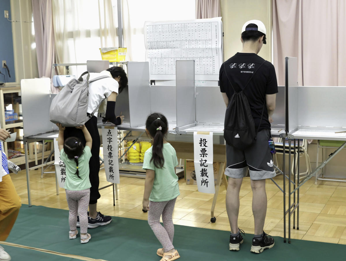 Voters in Tokyo cast ballots to decide whether to reelect incumbent conservative as city’s governor