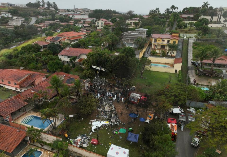 Eight cancer doctors among dead in Brazil plane crash – as seven others changed flight at last minute