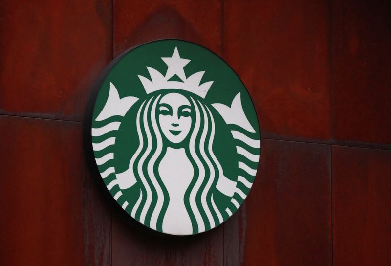 Elliott offers Starbucks settlement to allow CEO to keep top job, CNBC reports