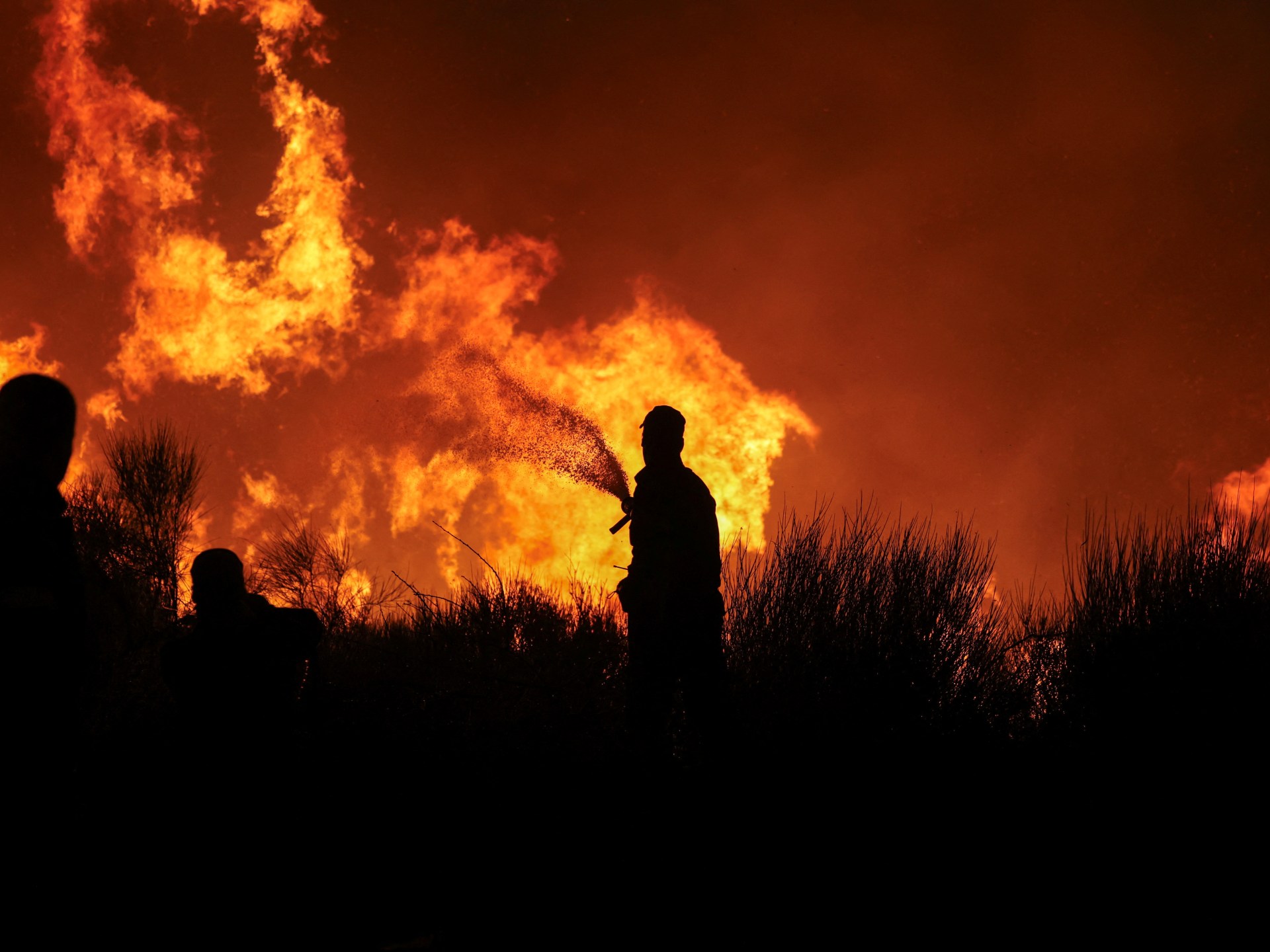 Firefighters battle Greece wildfires spreading towards Athens