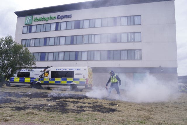 Holiday Inn owner urges calm after attacks on two hotels housing asylum seekers