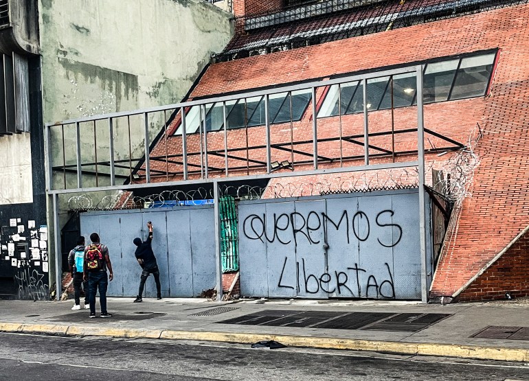 ‘I’m scared, but I’ll carry on’: Venezuelans caught between hope and fear