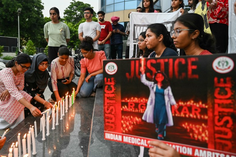 Indian doctors resume work but protests over medic’s rape, murder continue