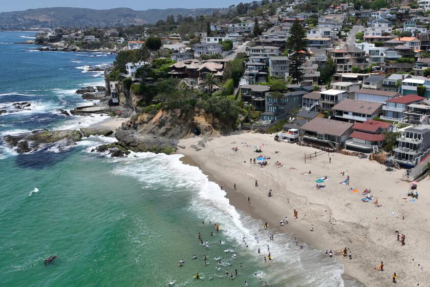 Laguna Beach woman who told beachgoers to ‘get out of here!’ reportedly targeted by Coastal Commission