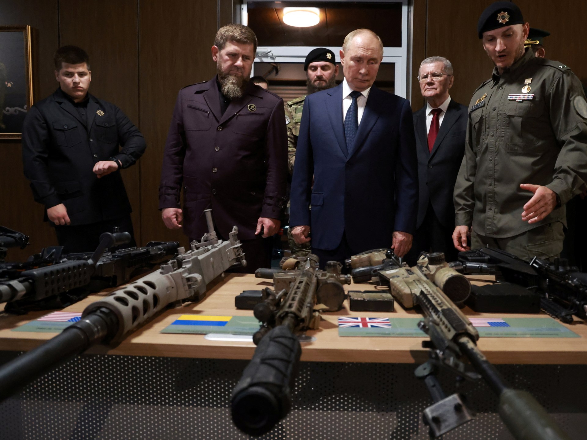 Putin inspects troops with Kadyrov on first Chechnya visit since 2011