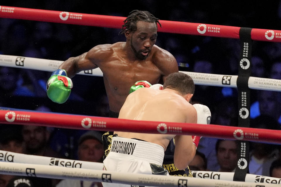 Terence Crawford beats Israil Madrimov via unanimous decision to claim title in 4th division