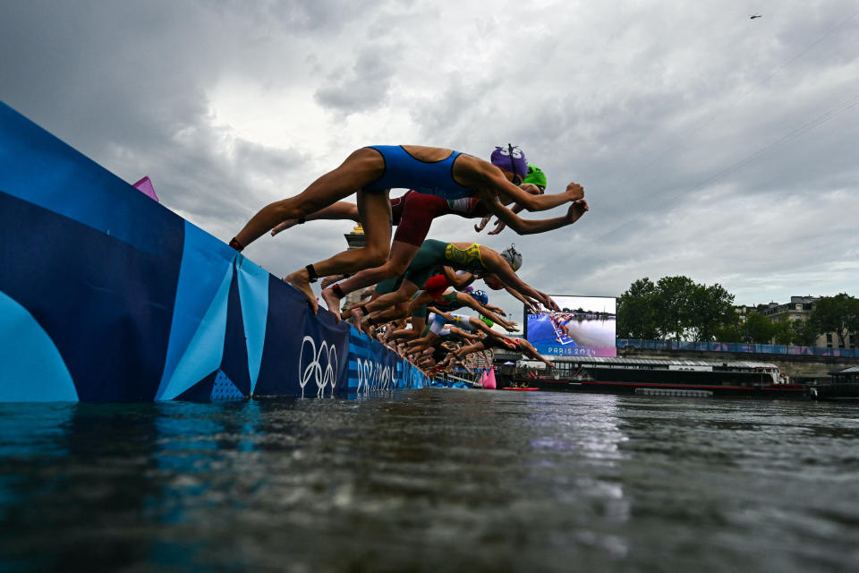 Triathlon makes in-Seine return to maligned river