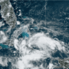 Tropical Depression 4 gets organized and is expected to strengthen