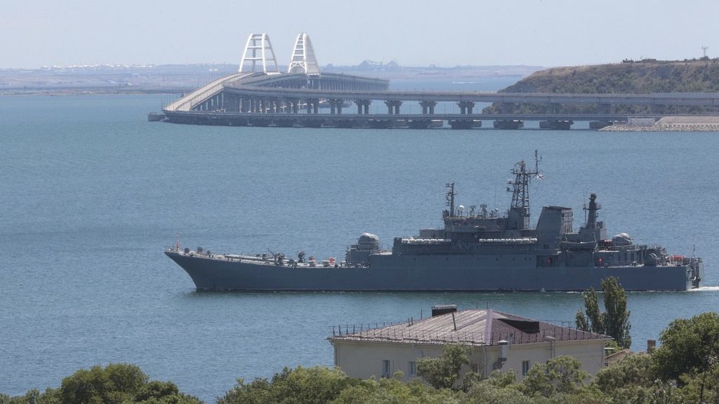 Ukraine strikes ferry crossing in occupied Crimea and vessel in Russia