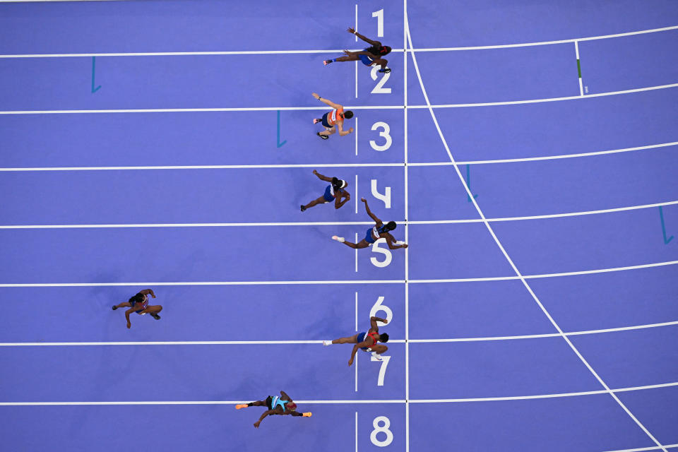 USA’s Masai Russell edges France’s Cyrena Samba-Mayela to win Olympic gold in 100-meter hurdles photo finish