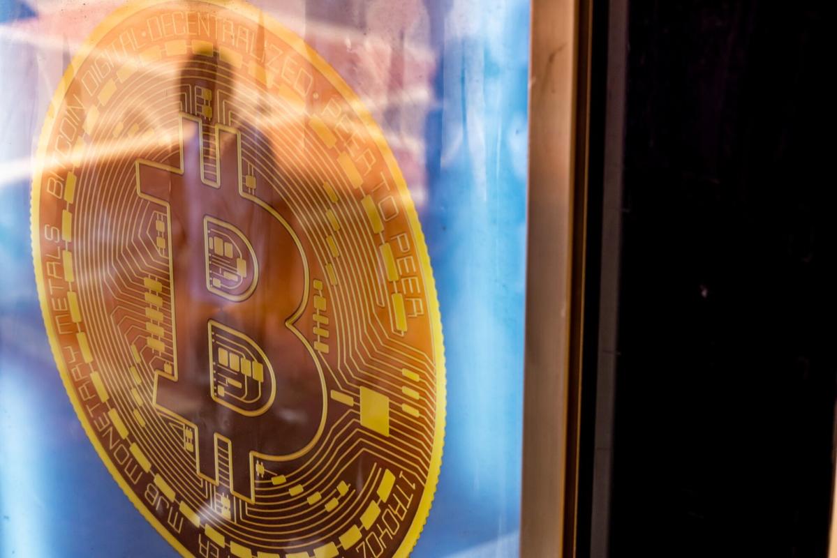 Bitcoin touches one-month low as glum traders hedge for payrolls