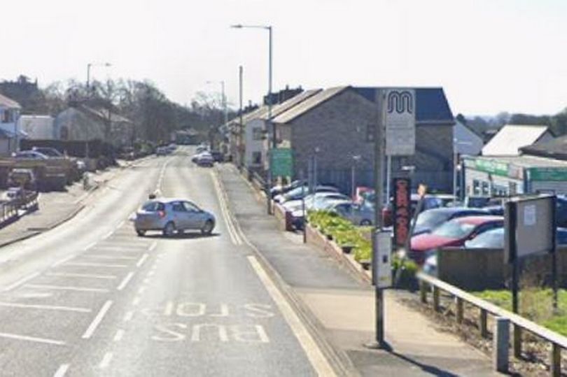 BMW smashes into a bus stop and wall after being ‘forced off the road’ by van driver