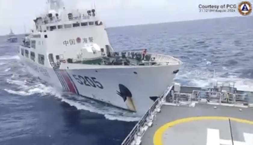 Chinese and Philippine vessels collide at a disputed atoll and governments trade accusations