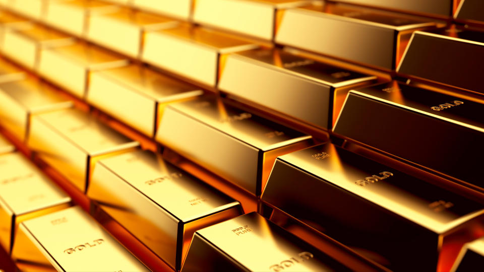 Gold hovers near record highs. Here’s where analysts say it’s headed next.