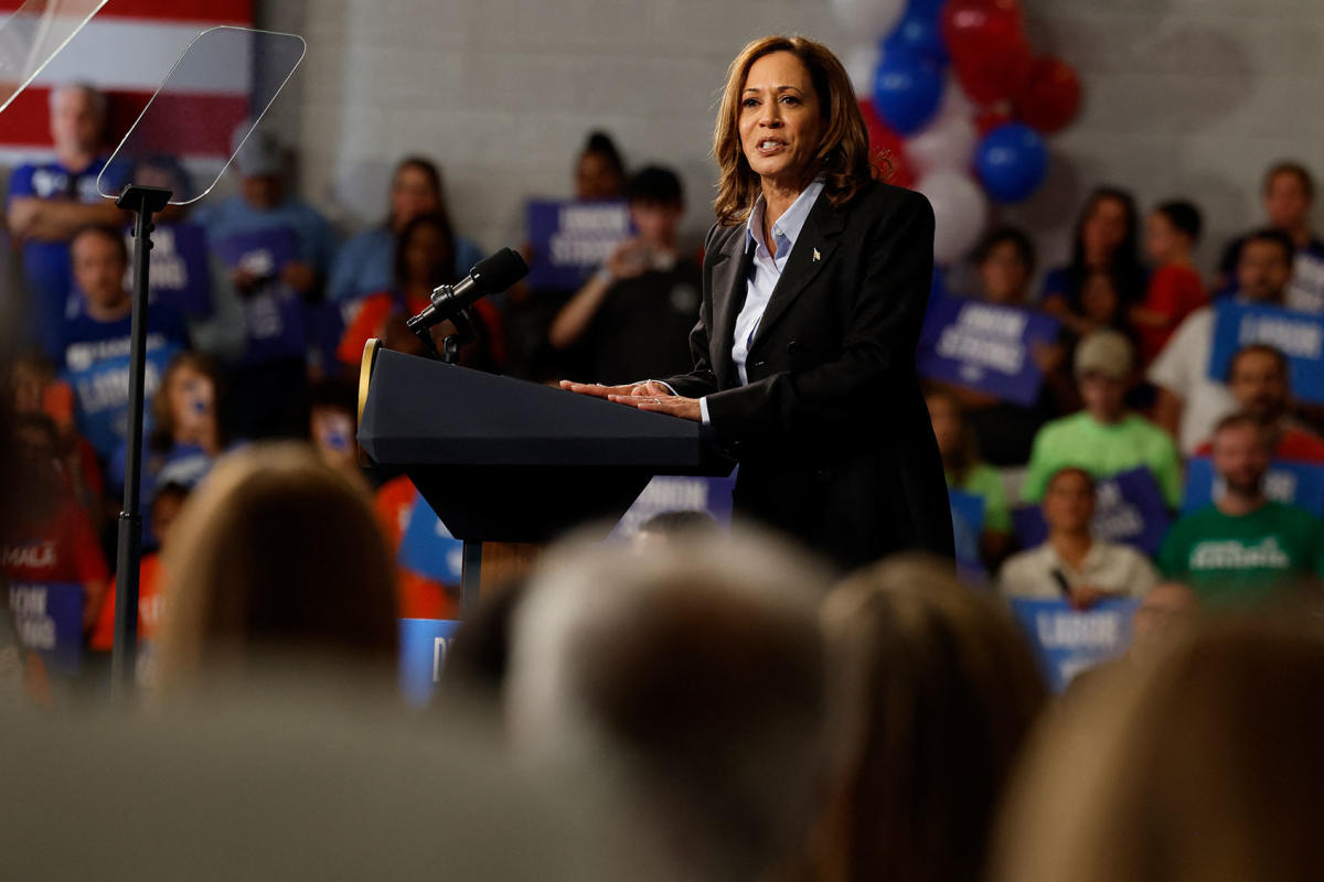 Kamala Harris draws cheers for response to audience member who shouted Trump is “going to jail”