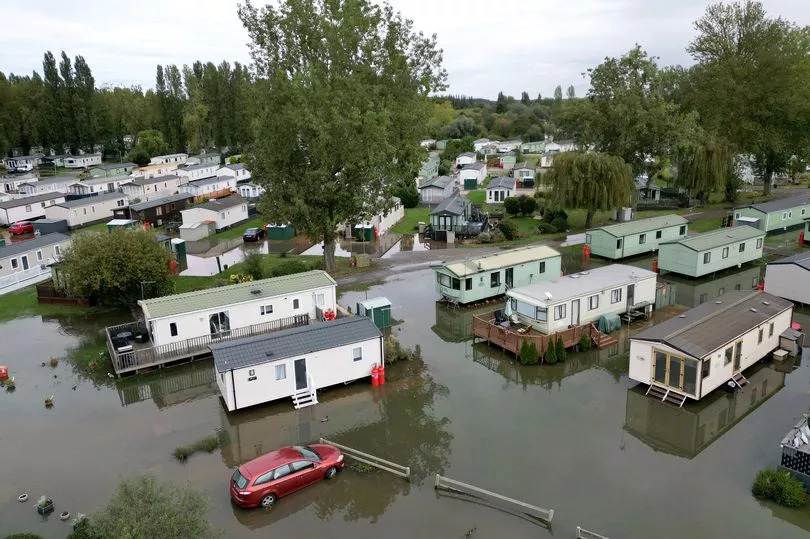 More heavy rain on way as dozens of people evacuated from flooded holiday park