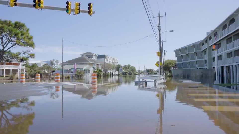 North Carolina beach town cleans up after ‘once-in-a-century’ storm